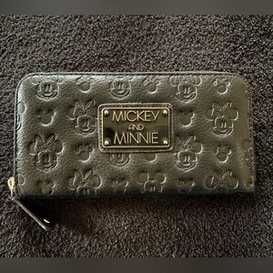 Loungefly Disney Mickey & Minnie Mouse debossed faux leather zip-around wallet.